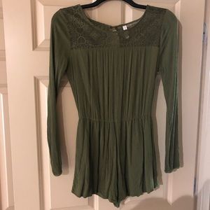 Green romper with lace details